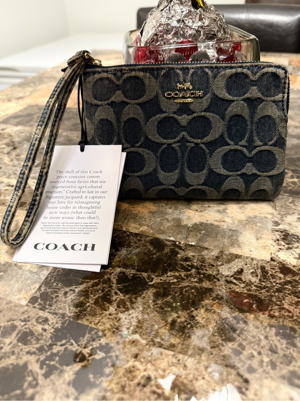 Corner Zip Wristlet In Signature Regenerative Cotton Denim.